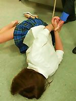 Tied student girl with spread legs bondaged